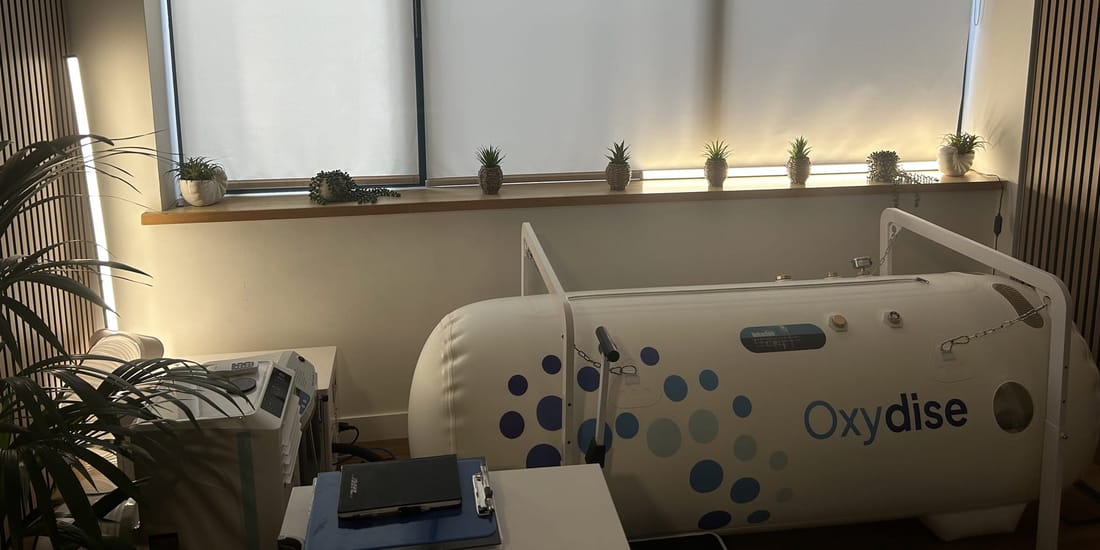 The Green Oxygen Oxydise soft-shell hyperbaric chamber beneath the studio window in Marlow - where a 60-minute HBOT session takes place