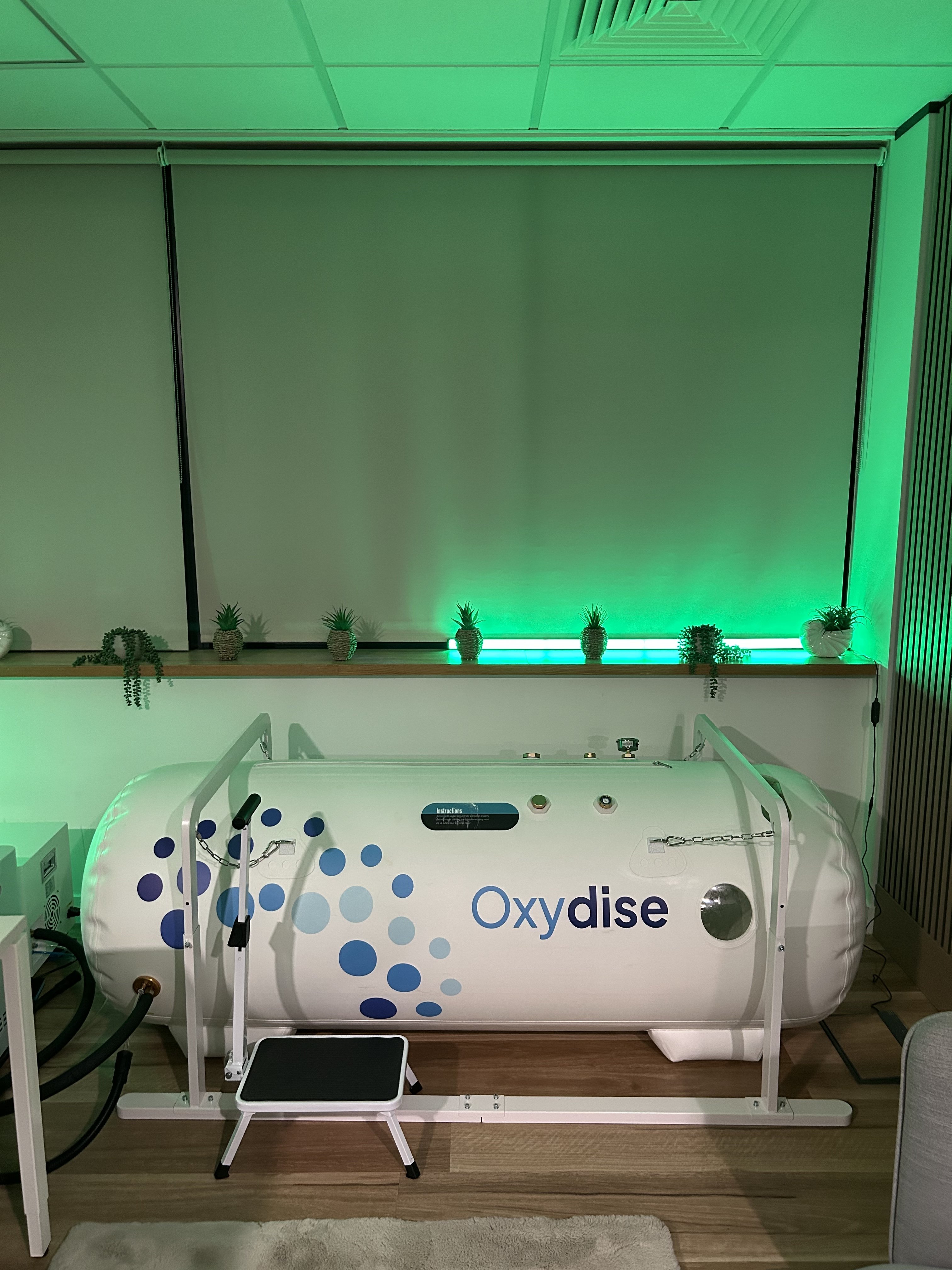 Green Oxygen Hyperbarics soft-shell hyperbaric oxygen chamber in the Marlow studio